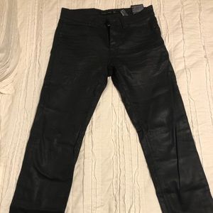 Men’s black coated jeans